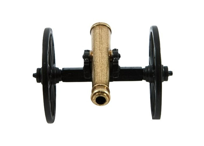 Brass cannon-like object with black wheels on a white background