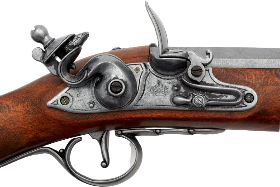 Close-up of a historical firearm with wooden stock and metal components on a white background.