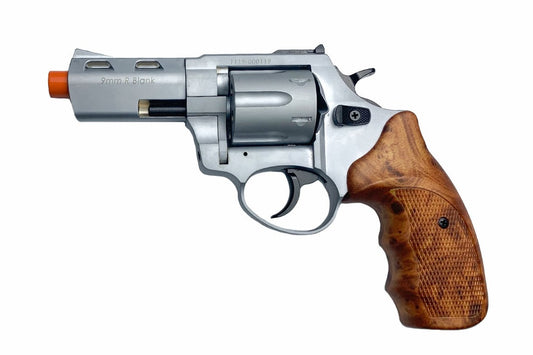 Revolver with wooden grip on a white background