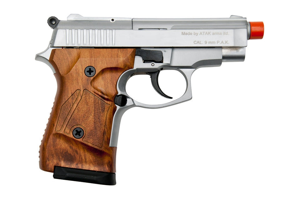 Silver and brown handgun with red tip on a white background