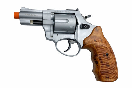 Revolver with wooden grip on a white background