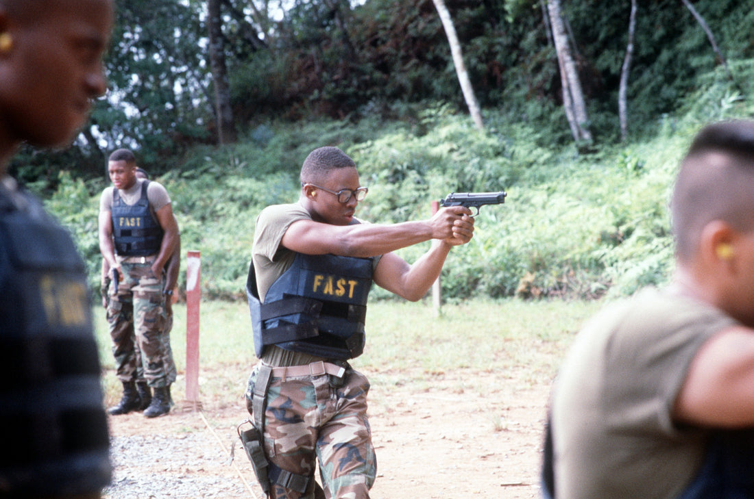 U.S. Marine firing a Beretta M9 pistol during combat training in Panama in 1989