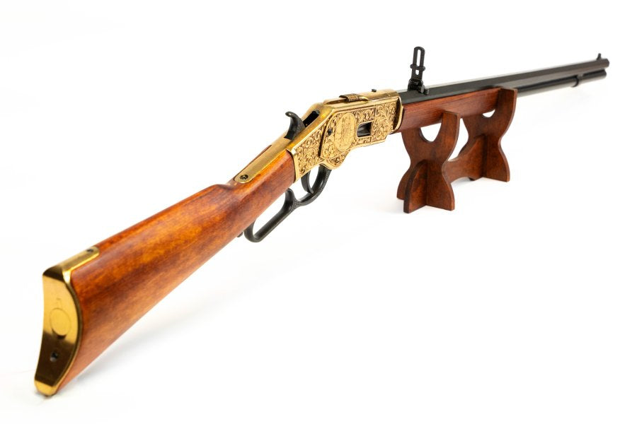 1873 Western rifle replica with engraved antique gold receiver and traditional wood stock