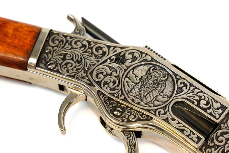 1873 Western carbine replica with silver tone metal finish and traditional wooden stock