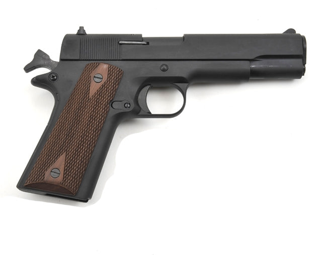 Full profile of non firing 45 Gov’t M1911 automatic military pistol replica with wood grips