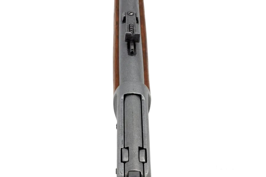 Barrel detail of antiqued Winchester 1892 lever action rifle replica