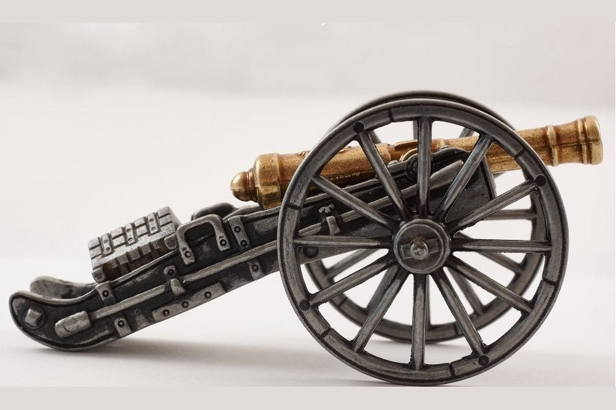 Model of a cannon on a white background