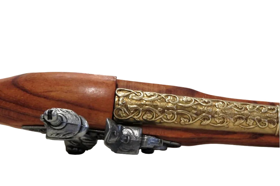 Detailed view of colonial flintlock pistol replica lock mechanism with decorative engraving and brass construction