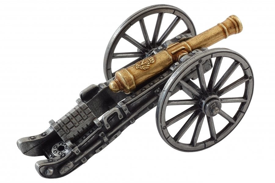 Model cannon with wheels on a white background
