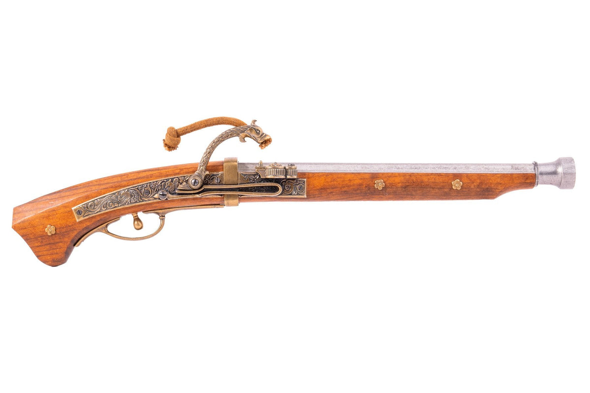 Denix 1021 Japanese matchlock pistol in brass, gray metal, and wood, full left-side profile