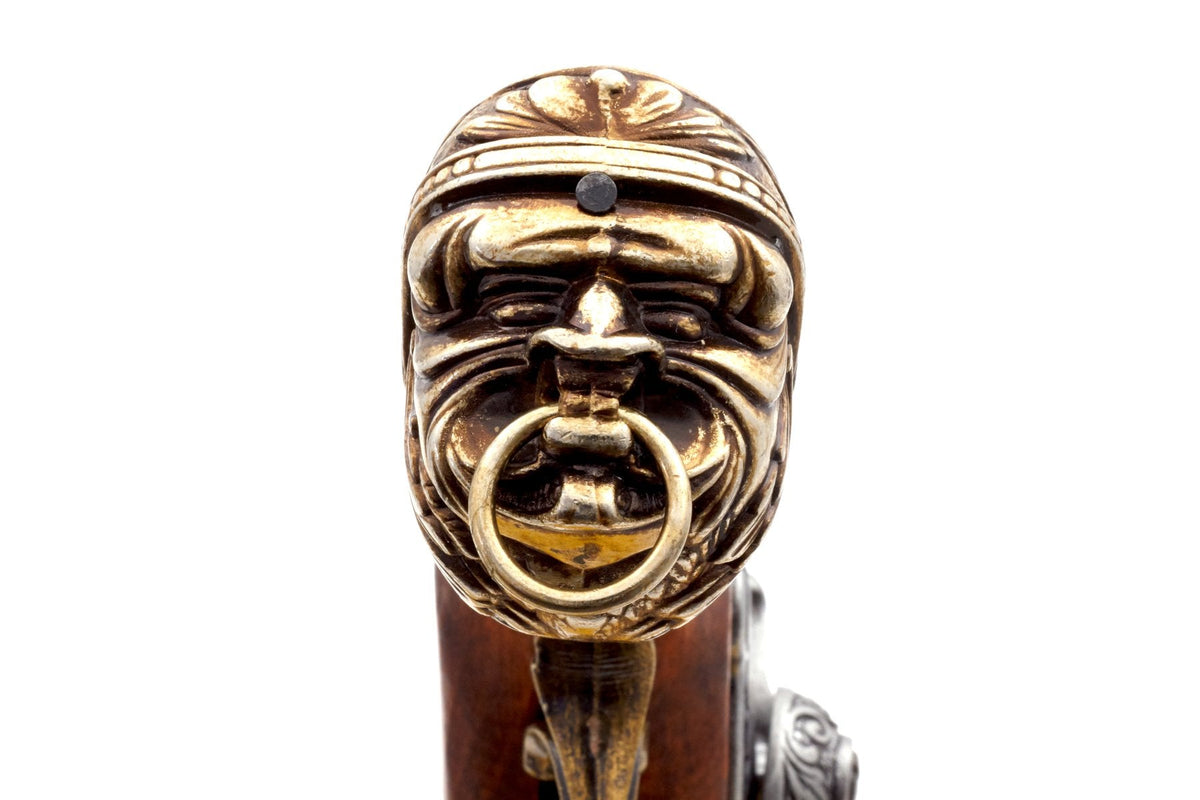 Denix 1104/L brass-finish pirate blunderbuss pistol, lion butt-cap front detail