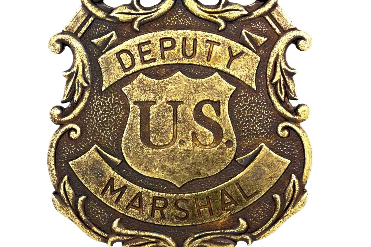 Denix 112L brass Deputy U.S. marshal eagle badge, close detail of raised lettering