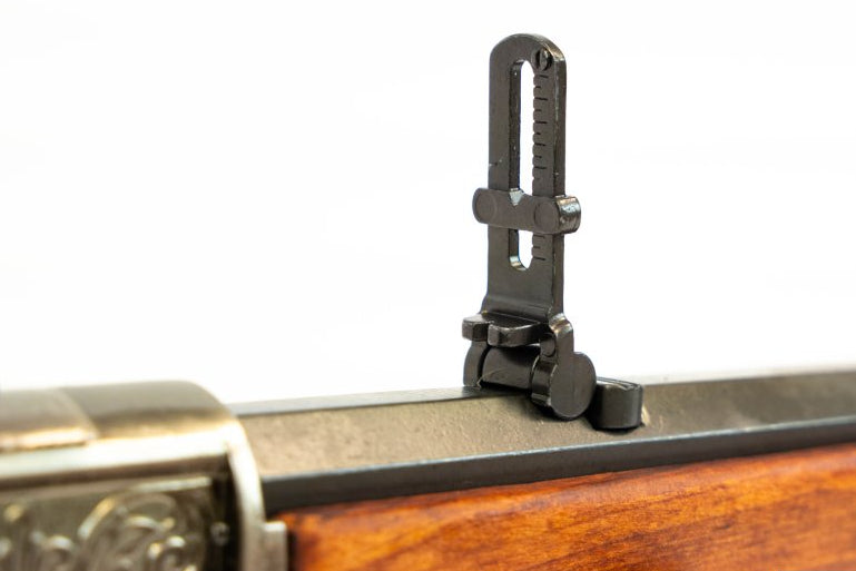 Denix 1873 Old West rifle replica with decorative silver finish and wooden furniture