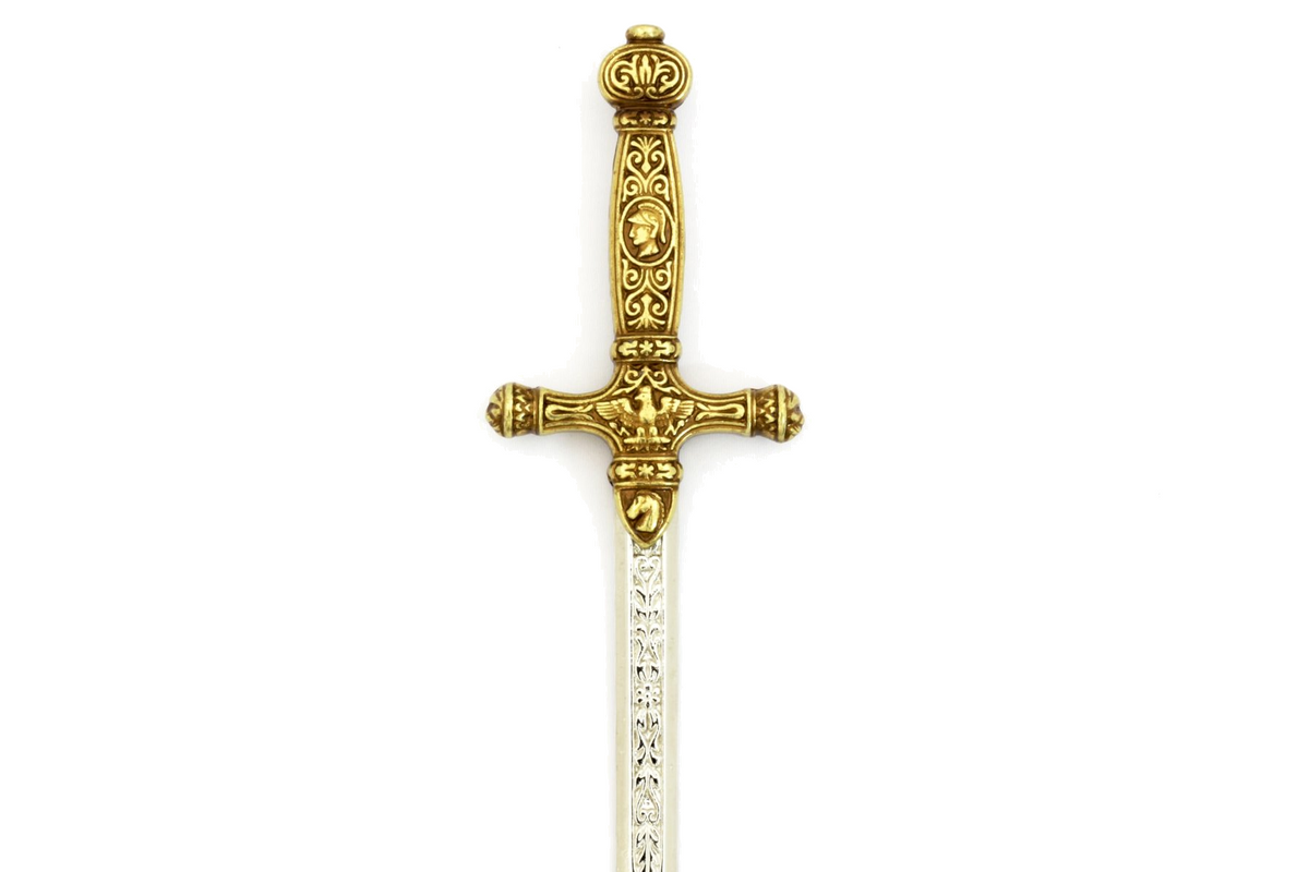 Denix 3029 Napoleon sword letter opener vertical view highlighting the ornate brass hilt and engraved blade