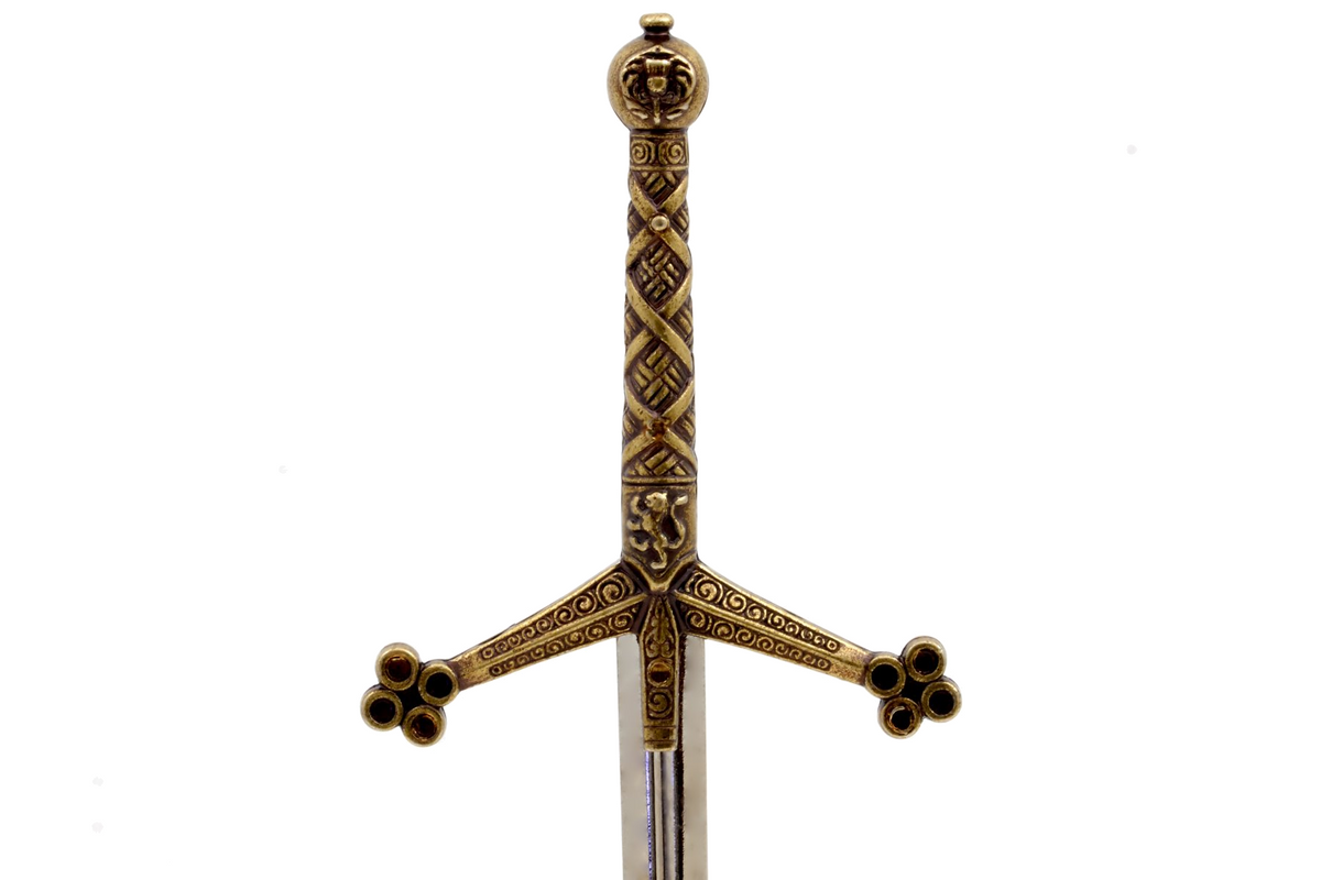 Denix 3047 Claymore sword letter opener decorated brass hilt, patterned grip, and crossguard close-up