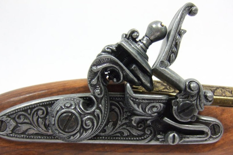 Denix antique flintlock pistol replica with polished brass finish inspired by colonial era firearms