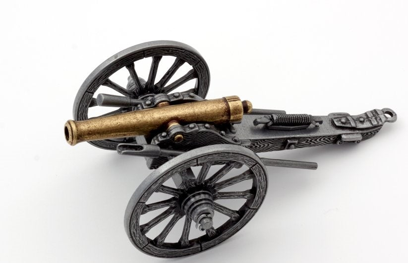 Model of a vintage cannon on a white background