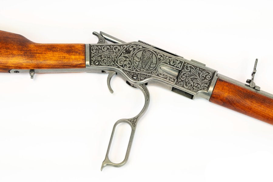 Model 1873 lever action carbine replica with antique silver finish and wooden furniture