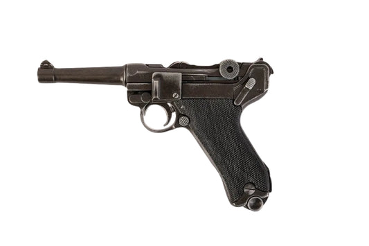 Vintage black Luger pistol on a white background with Denix logo.