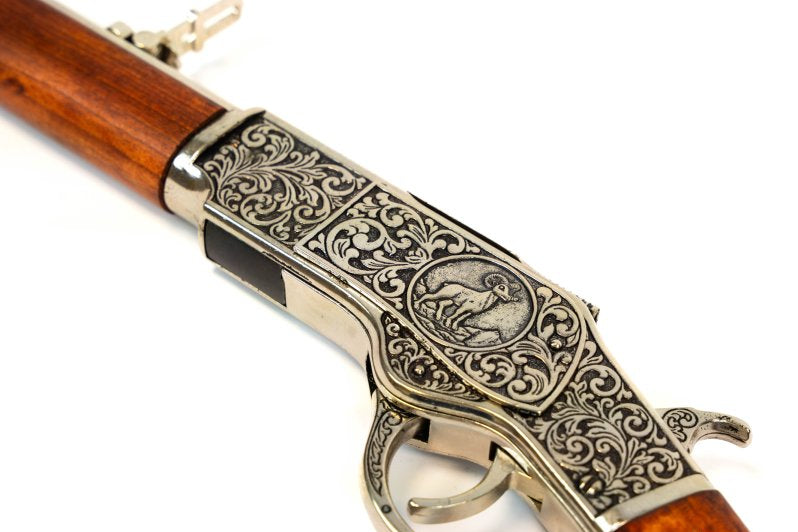 Denix Western 1873 carbine replica featuring engraved metalwork and bright silver finish