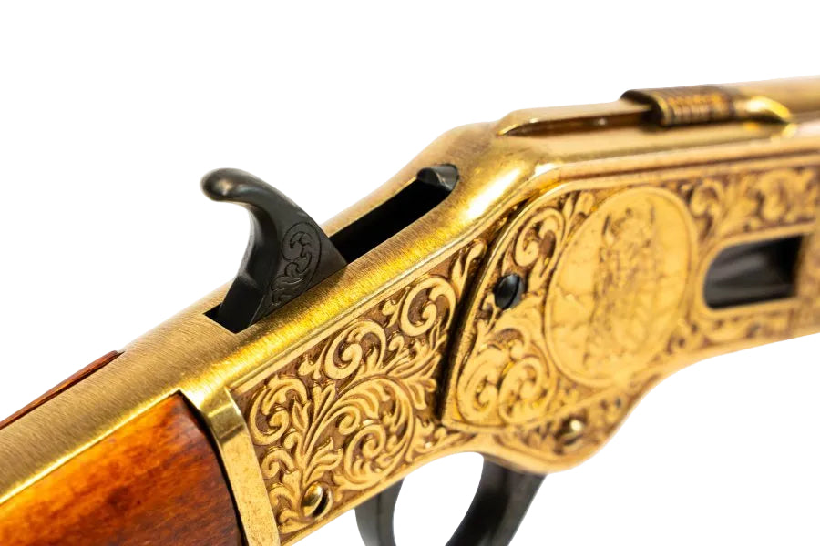 Denix Western 1873 rifle replica featuring detailed engraving and antique gold finish
