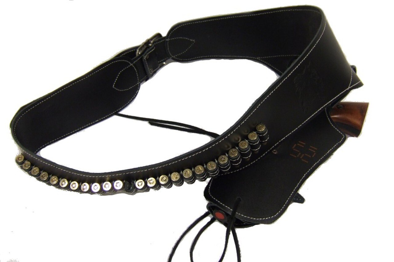 Black leather guitar strap with studs on a white background