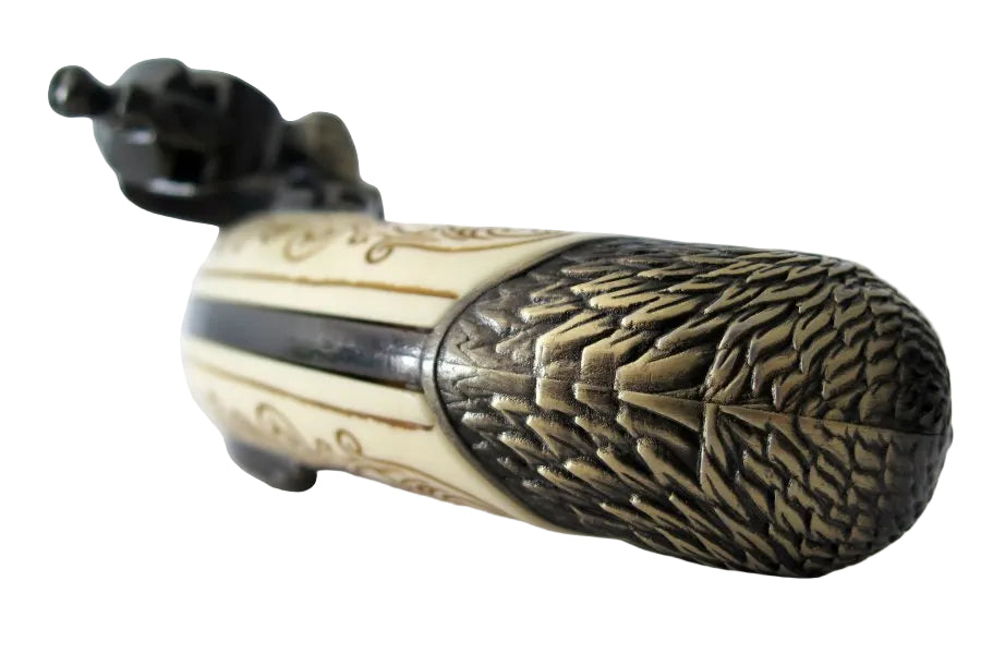Brass frame detail on three barrel flintlock pistol replica