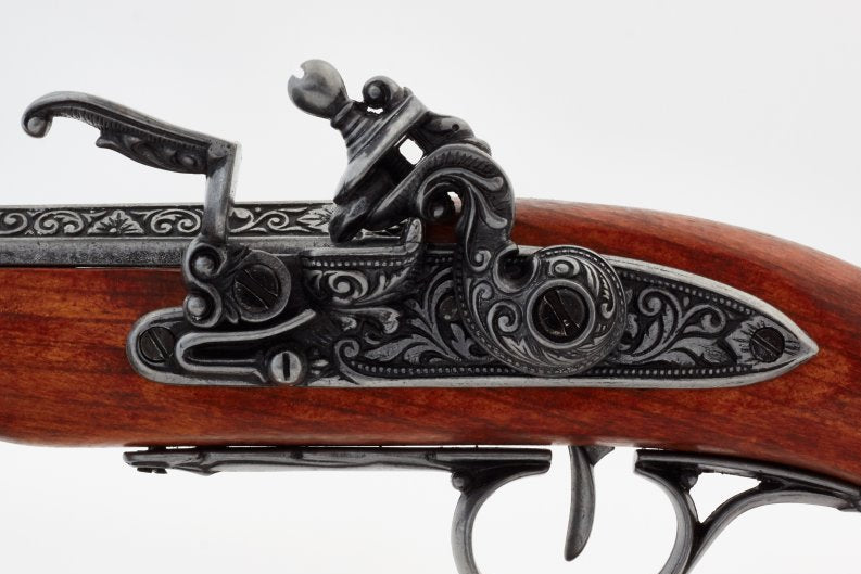 Left handed English flintlock gray finish displayed as pirate prop or collectible