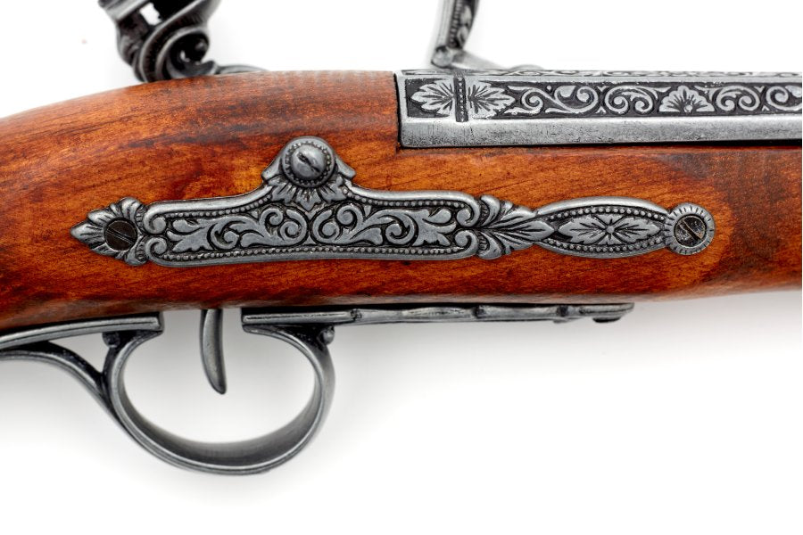 Detailed view of left handed flintlock pistol replica lock mechanism with authentic Napoleonic era styling