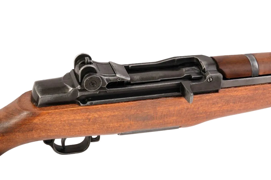 Close up detail of the wood stock on the M1 Garand 30 caliber replica rifle showing authentic craftsmanship