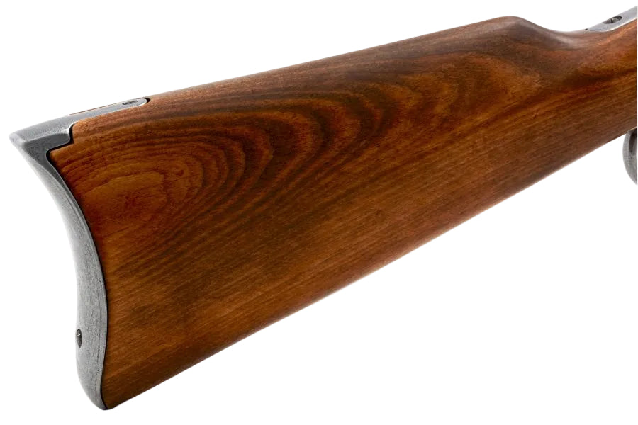 Close up of M1892 replica rifle showing lever action mechanism and antiqued metal finish