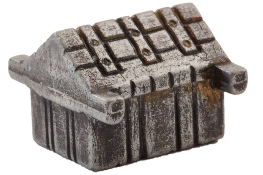 Decorative metal box with textured surface on a white background