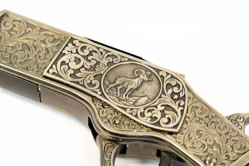 Model 1873 antique silver rifle replica with ornate receiver and traditional wooden stock