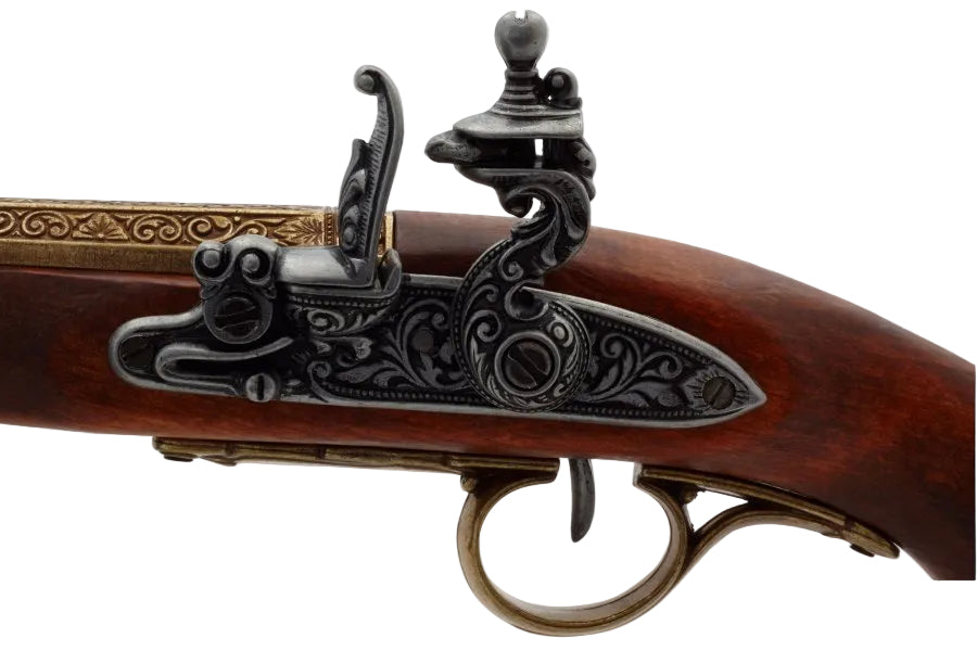Close up of Napoleonic brass flintlock pistol replica highlighting decorative metalwork and craftsmanship