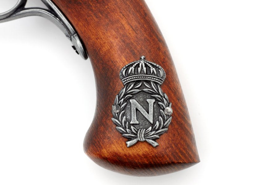 Close up of Napoleonic flintlock pistol replica highlighting gray finish and historically inspired craftsmanship